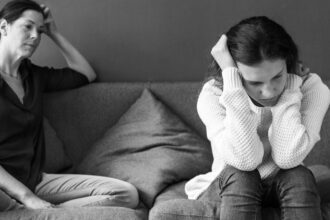 mother teenage daughter having arguument