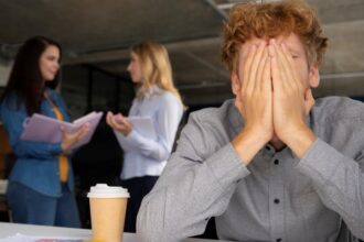 young adult dealing with imposter syndrome