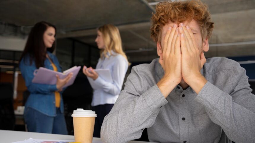young adult dealing with imposter syndrome